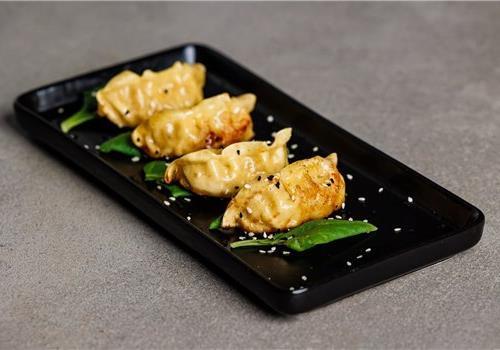 גיוזה עוף בעבודת יד צרובה 4 יח'