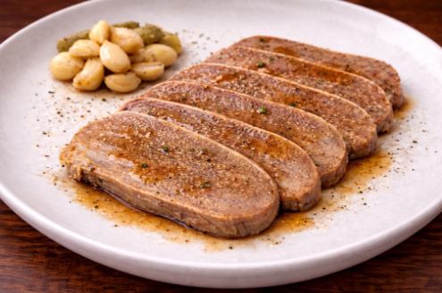 פרוסות לשון ברוטב שום יין ודבש