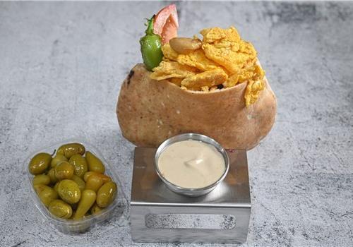 מקושקשת בפיתה