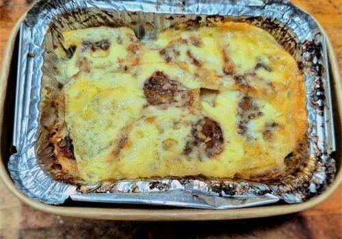 תוספת בתשלום - פרוסות תפו"א אפויות בשמנת מתוקה בהקרמת גבינת גאודה